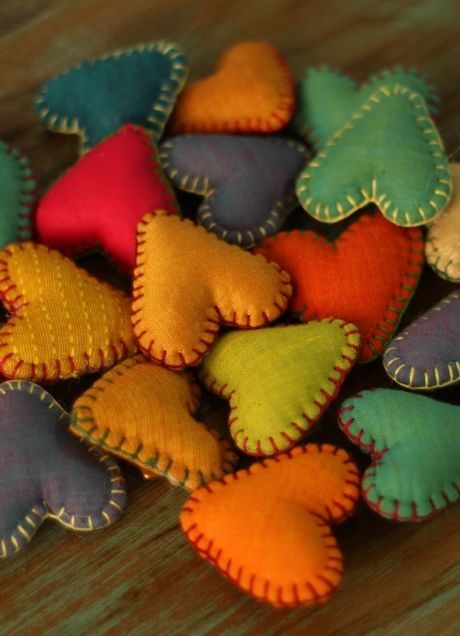 Colourful fabric heart pins made from discarded patches of cloth